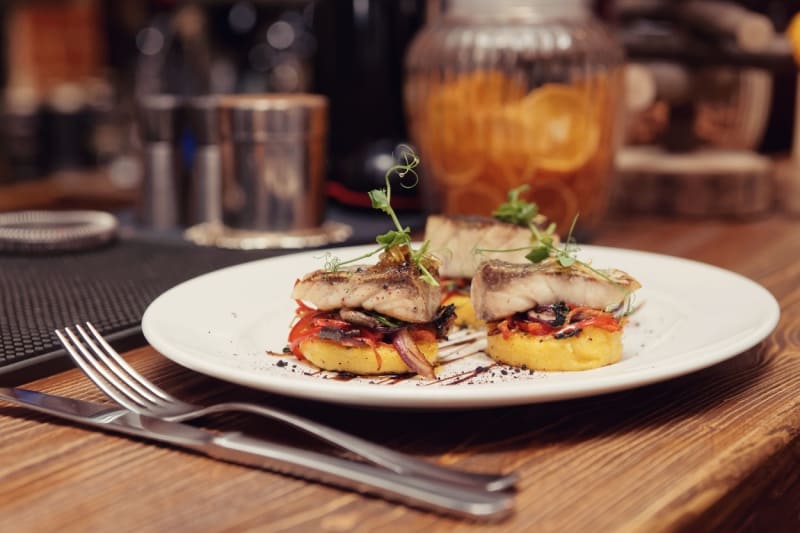 Branzino con polenta