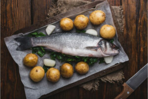 come fare filetto di branzino in crosta di patate