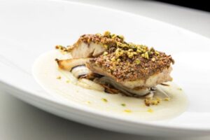 ricetta filetti di orata con granella di pistacchio